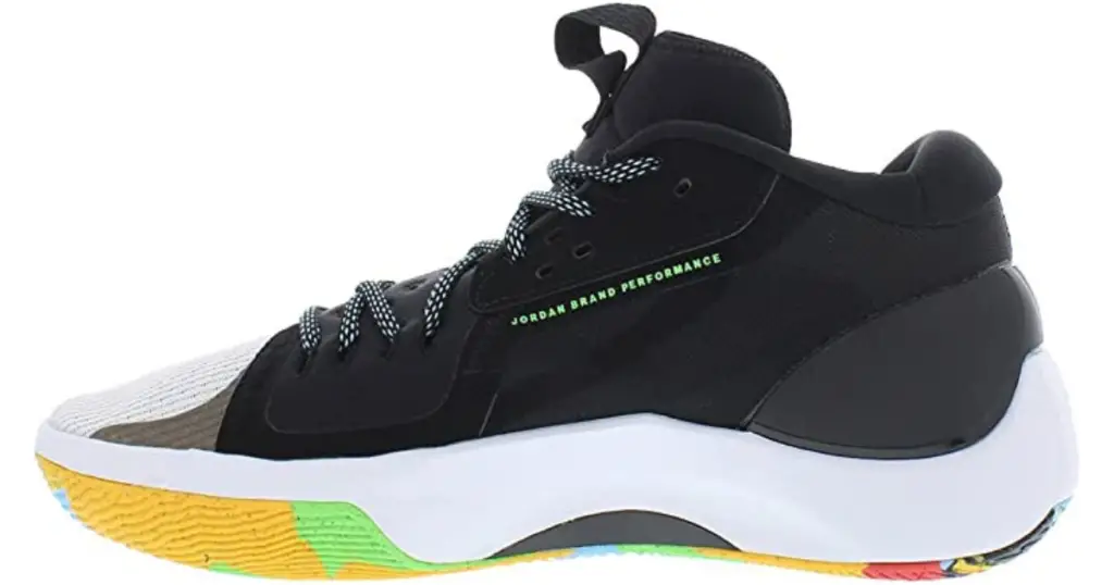 Product photo of Air Jordan Zoom Separate basketball shoe, black with thick white sole with multi-color underside. Small green text along lacing reads "Jordan Brand Performance."