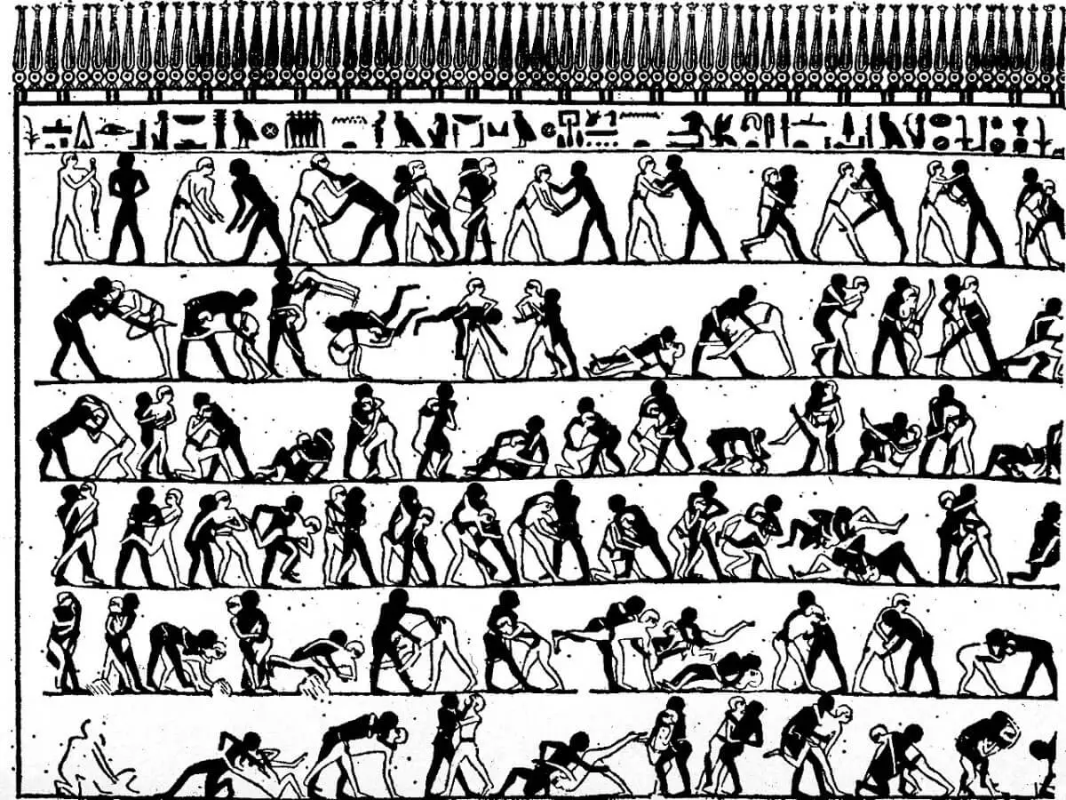 Egyptian hieroglyphs depicting wrestling in ancient egypt.