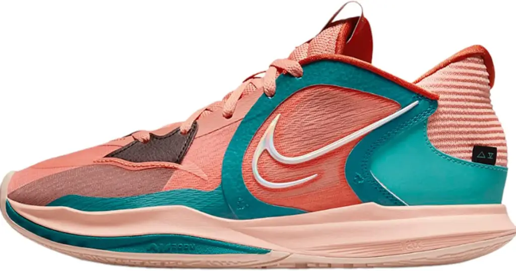 Image of Nike Kyrie 5 Low Men's Basketball Shoes, salmon pink with teal green accents on sides and sole, with white outline of Nike swoosh on side.