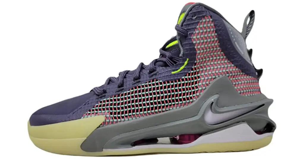 Nike Air Zoom Jump G.T. shoe in profile, mesh side (pink and green interwoven), with purple toe (top), yellow sole, gray heel.