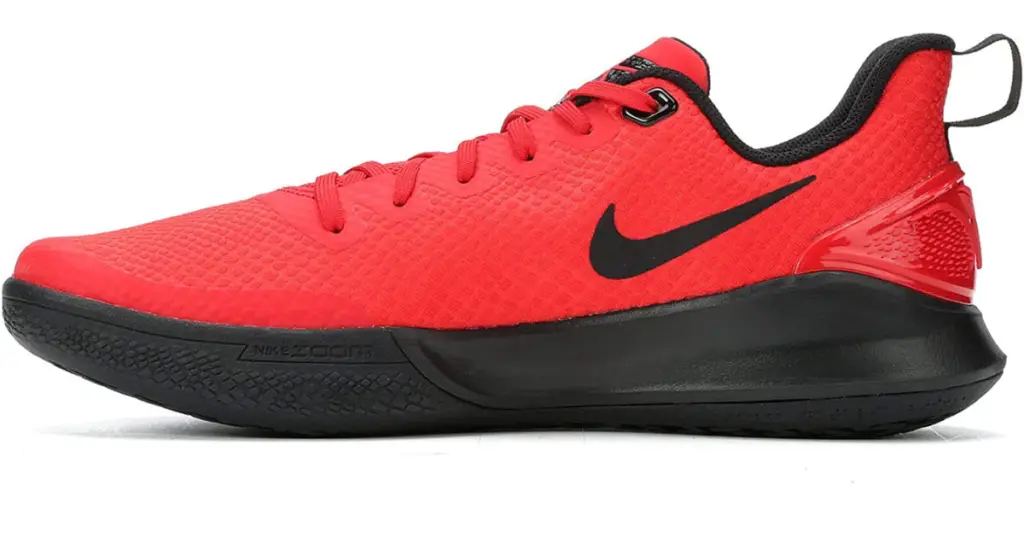 Closeup side view of Nike Men’s Kobe Mamba Focus Basketball Shoe. red with black sole and Nike swoosh.
