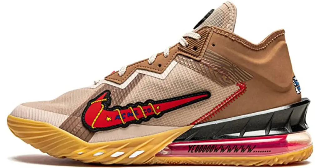 Profile photo of Nike Lebron 18 Low basketball shoe, beige with red/orange Nike swoosh on the front side, with yellow sole in the front and black/pink/yellow sole in the back.