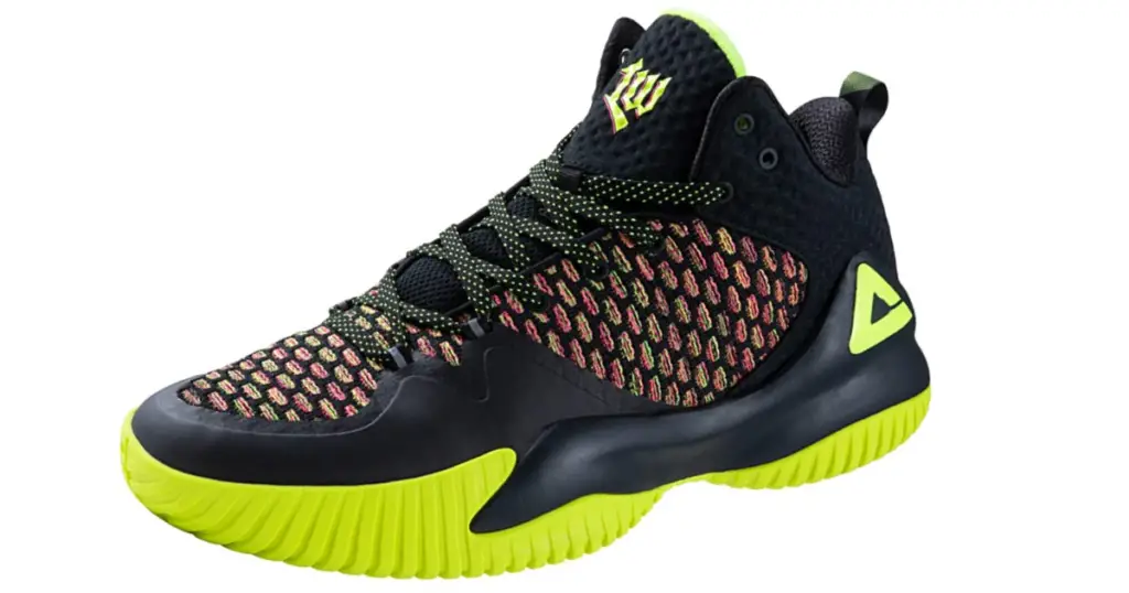Product photo of PEAK High Top Streetball Master basketball shoe, black with textured detailing on side and front toe, neon triangle logo on back heel, bright yellow sole.