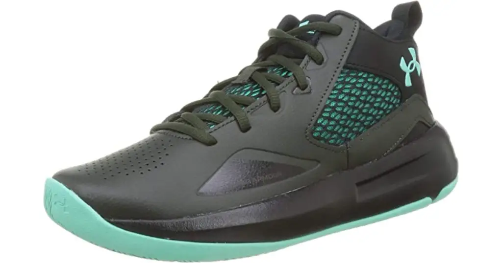 Product photo of Under Armour Lockdown 5 basketball shoe, dark gray with mint green Under Armour logo on back heel, and mint green bottom sole, and mint green and black textured detailing on side and shoe tongue.
