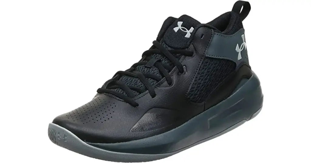 The Under Armour Lockdown shoe in profile, all black (top to bottom and interior) with white Under Armour logo on upper (front) and side.