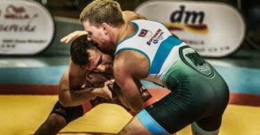 Wrestling sport for exercise and exhibition match between semi-professional wrestlers.