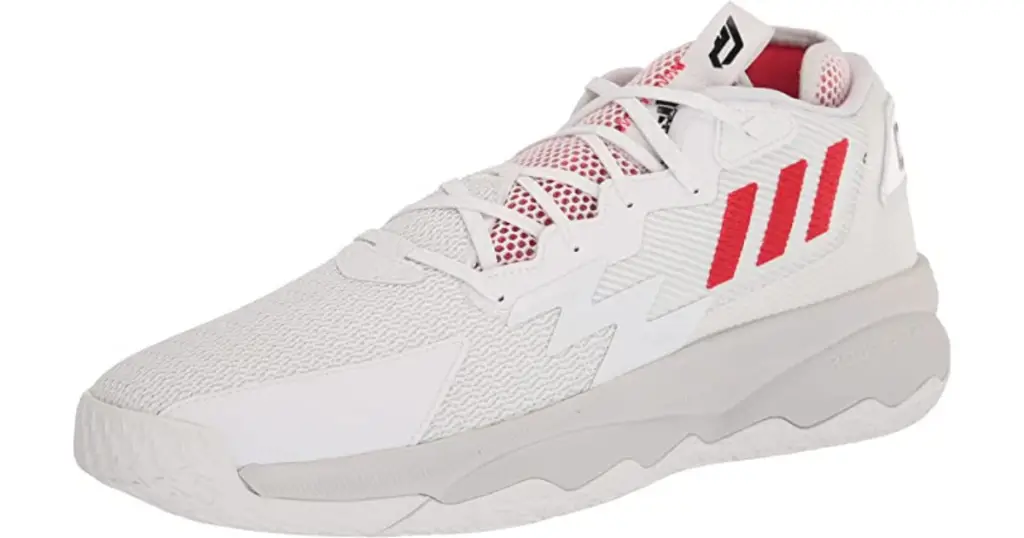 Product photo of Adidas Dame 8 basketball shoe, white with red Adidas logo on side.