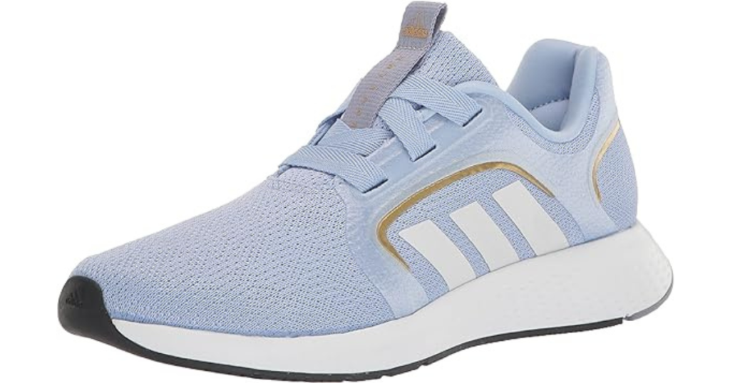 Stock photo of Adidas Women's Edge Lux 5 Shoe for Zumba, light blue with white outsole and white Adidas stripes on the side.